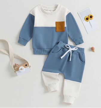 Blue and white colorblock sweatshirt and joggers with a tan chest pocket and white drawstring