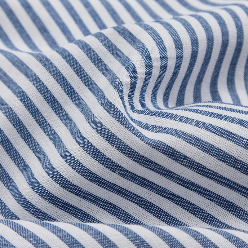 Close-up of the blue-and-white striped cotton-linen fabric
