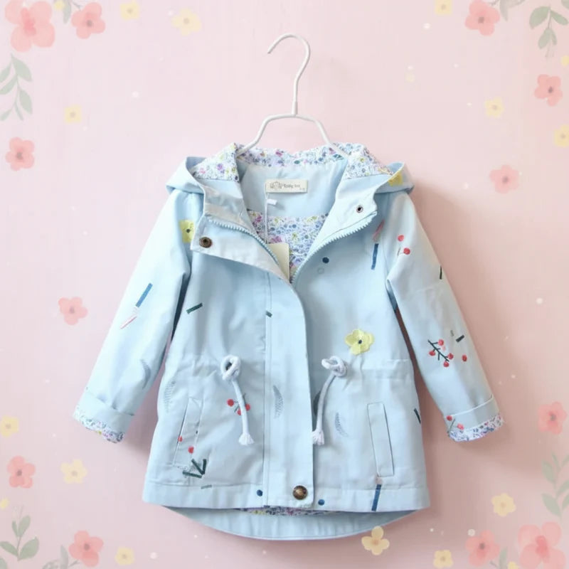 Front of the blue hooded windbreaker with pockets, a drawstring waist, and floral lining