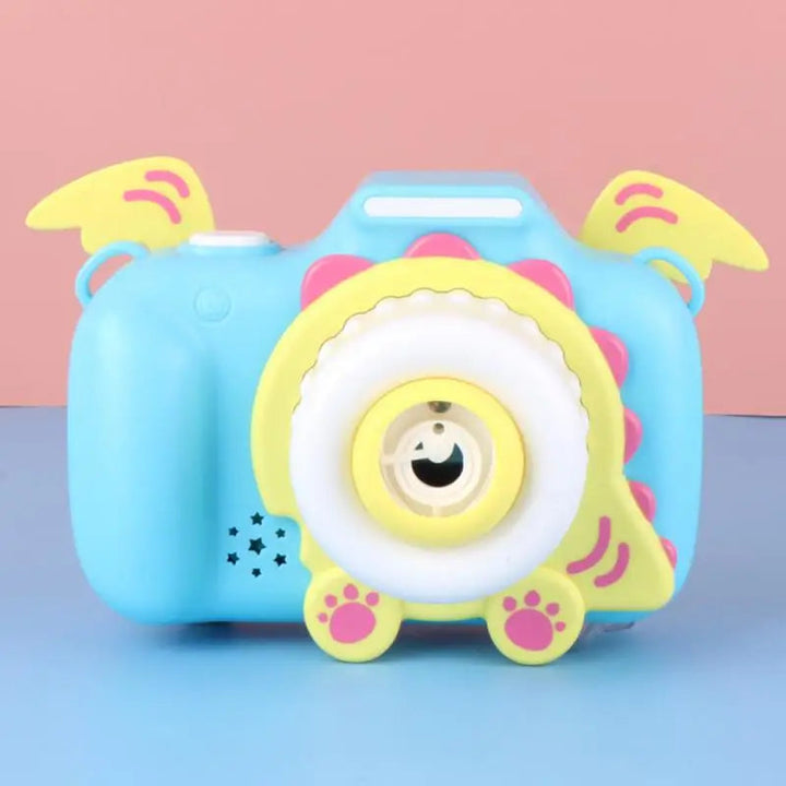 Blue bubble camera with yellow wings, a white bubble outlet, and pink paw accents.