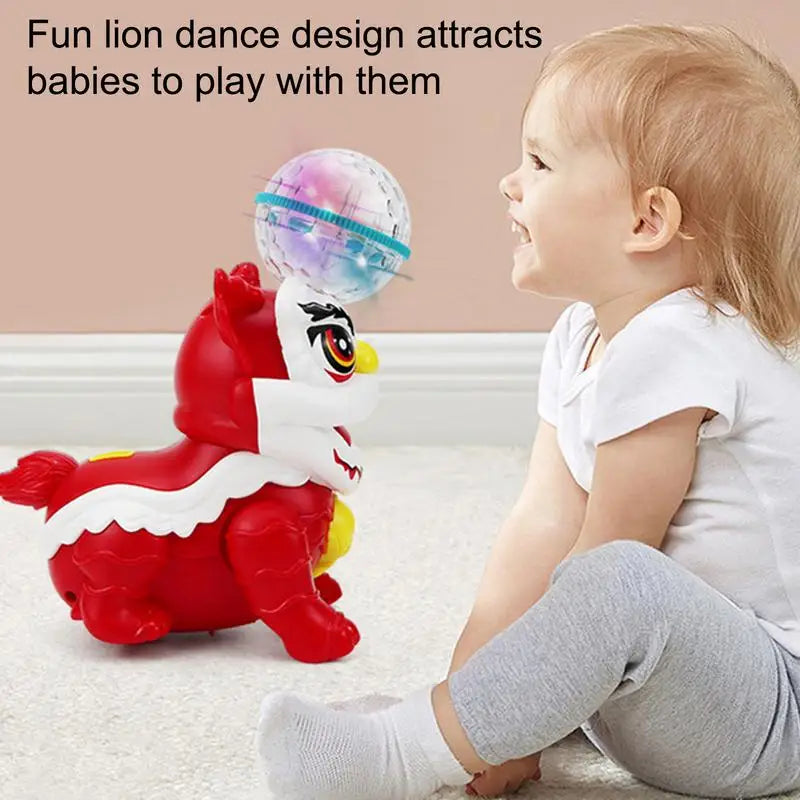 Young child sitting beside the red-and-white musical lion with its illuminated globe.