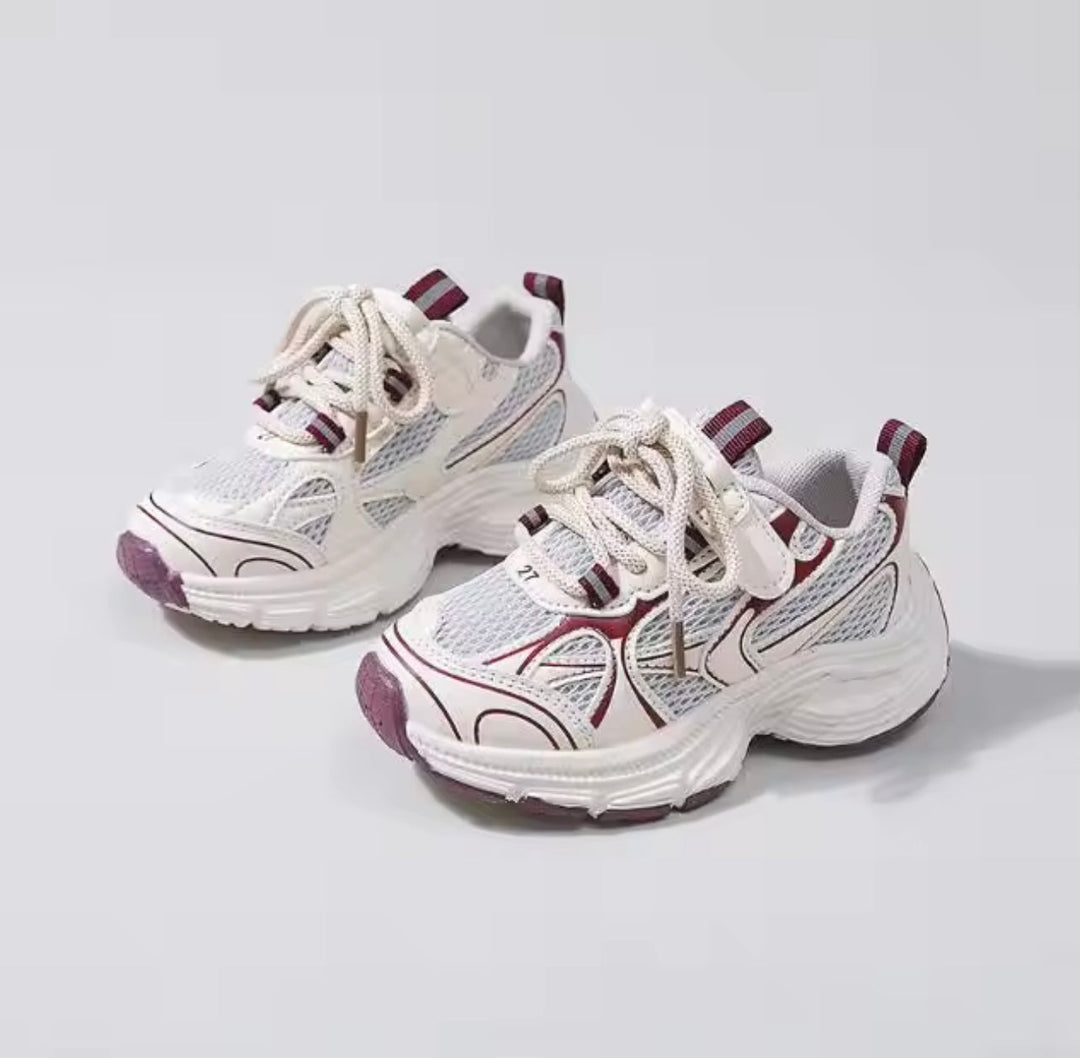 Pair of white and bordeaux sneakers with cream laces and striped heel pull tabs