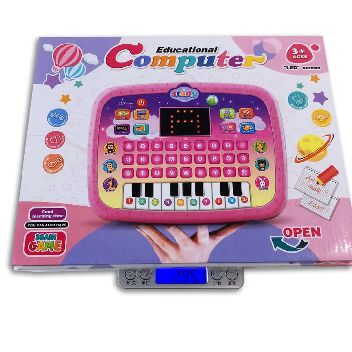 Packaging for a pink learning toy tablet on a digital scale, labeled for ages 3 and up