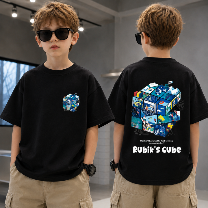 Boy wearing a black puzzle-cube T-shirt and beige shorts, shown from the front and back