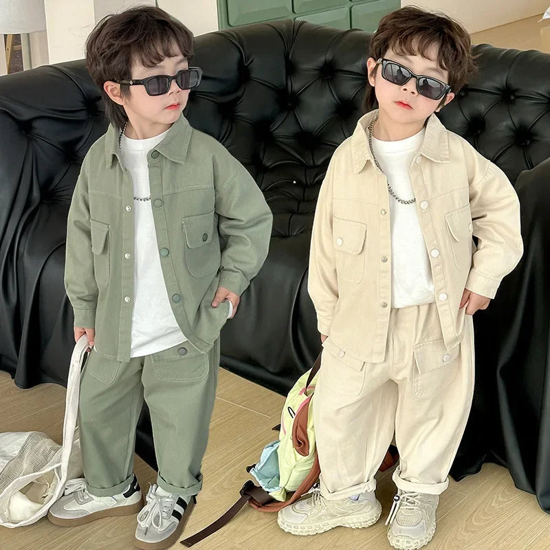 Children wearing sage green and sand beige cargo sets with collared shirts and matching pants
