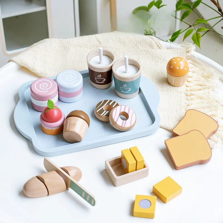 Breakfast play food with cups, toast, slice-apart bread, butter, and a wooden knife