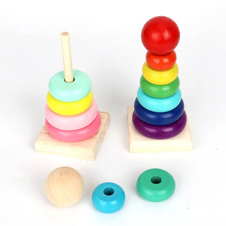 Bright and pastel wooden stacking towers with loose rings and a wooden ball topper