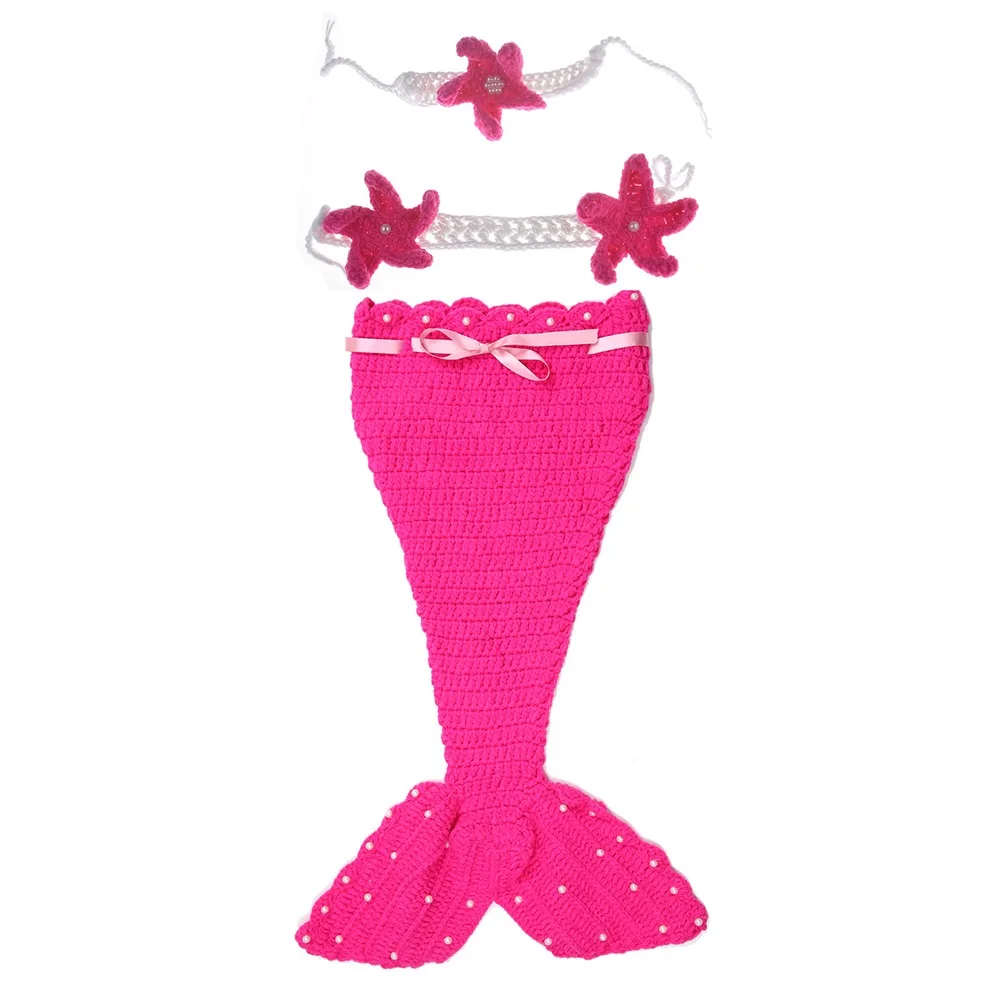 Bright pink three-piece baby mermaid costume with a wide-fin tail and starfish accessories