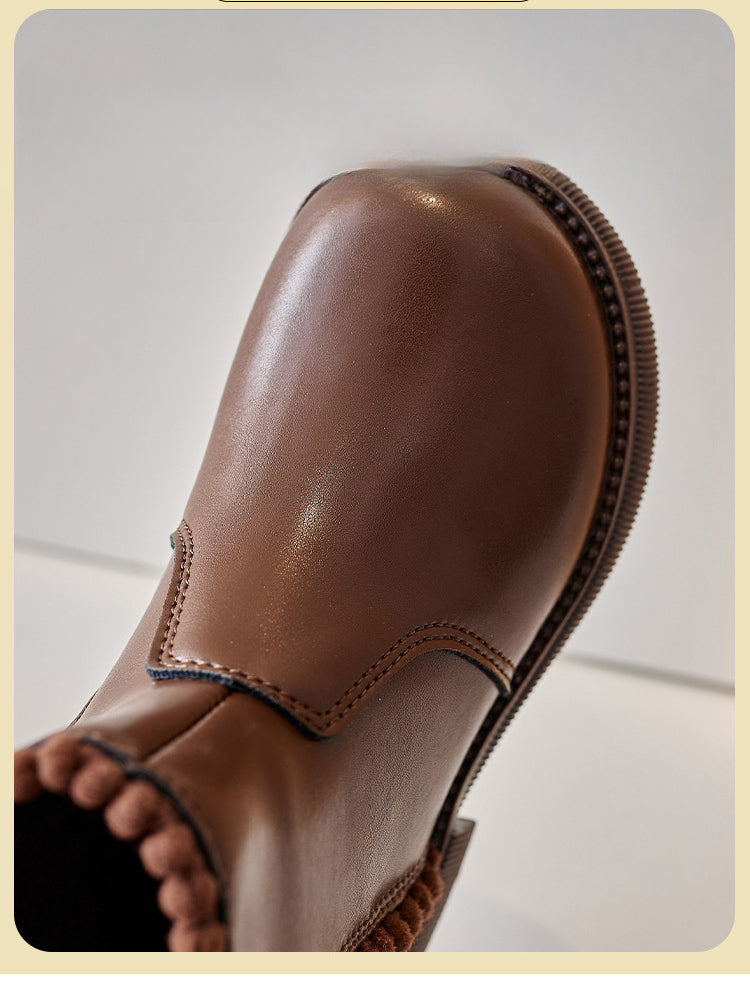 Close-up of a brown ankle boot&