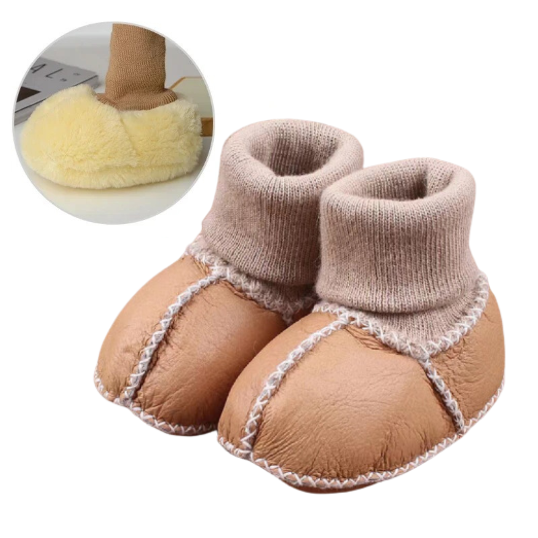 Brown baby slippers with rolled taupe knit cuffs and light contrast stitching