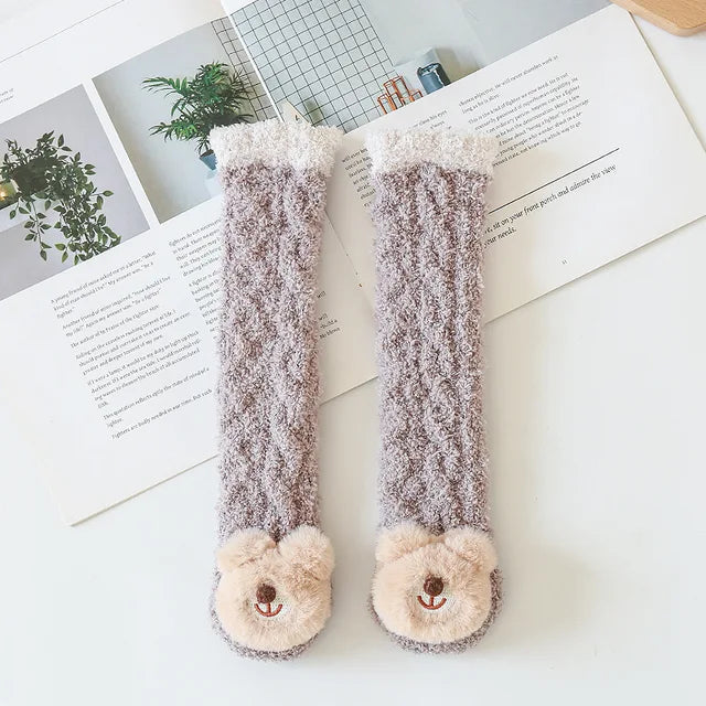 Brown long socks with cream cuffs and bear faces on the toes