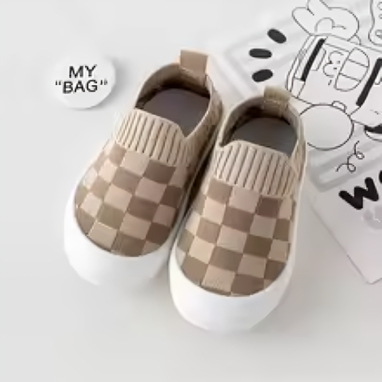 Pair of brown-beige checkered slip-on shoes with ribbed openings and white soles