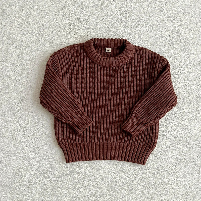 Brown cotton knit sweater with a round neckline, long sleeves, and ribbed cuffs and hem.