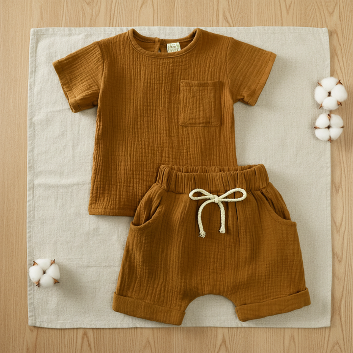 Brown cotton T-shirt with a chest pocket and matching shorts with a front tie.