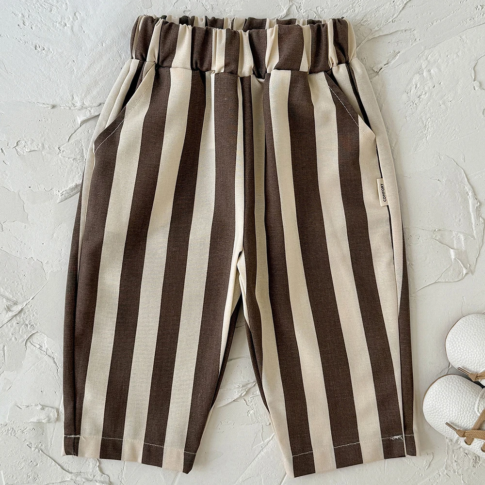 Brown and cream striped baby pants with an elastic waist and side pockets