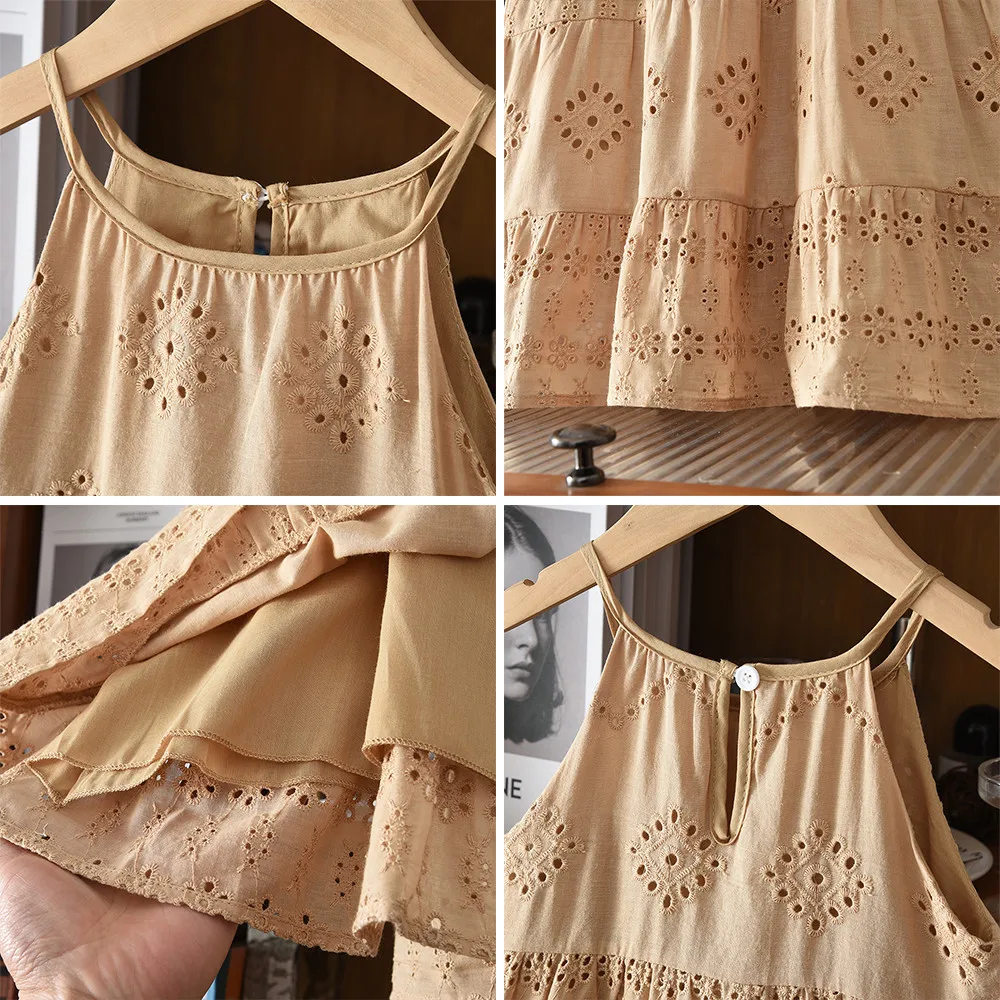 Brown eyelet dress details showing the neckline, button back, skirt tiers and inner layer