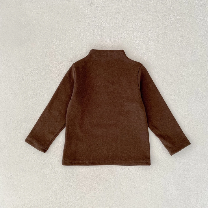 Brown baby sweater with long sleeves and a high round neckline, laid flat.