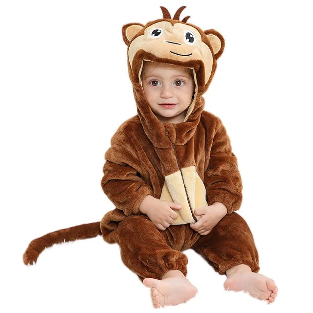 Baby in a brown monkey romper with a character hood, beige belly, and long tail.
