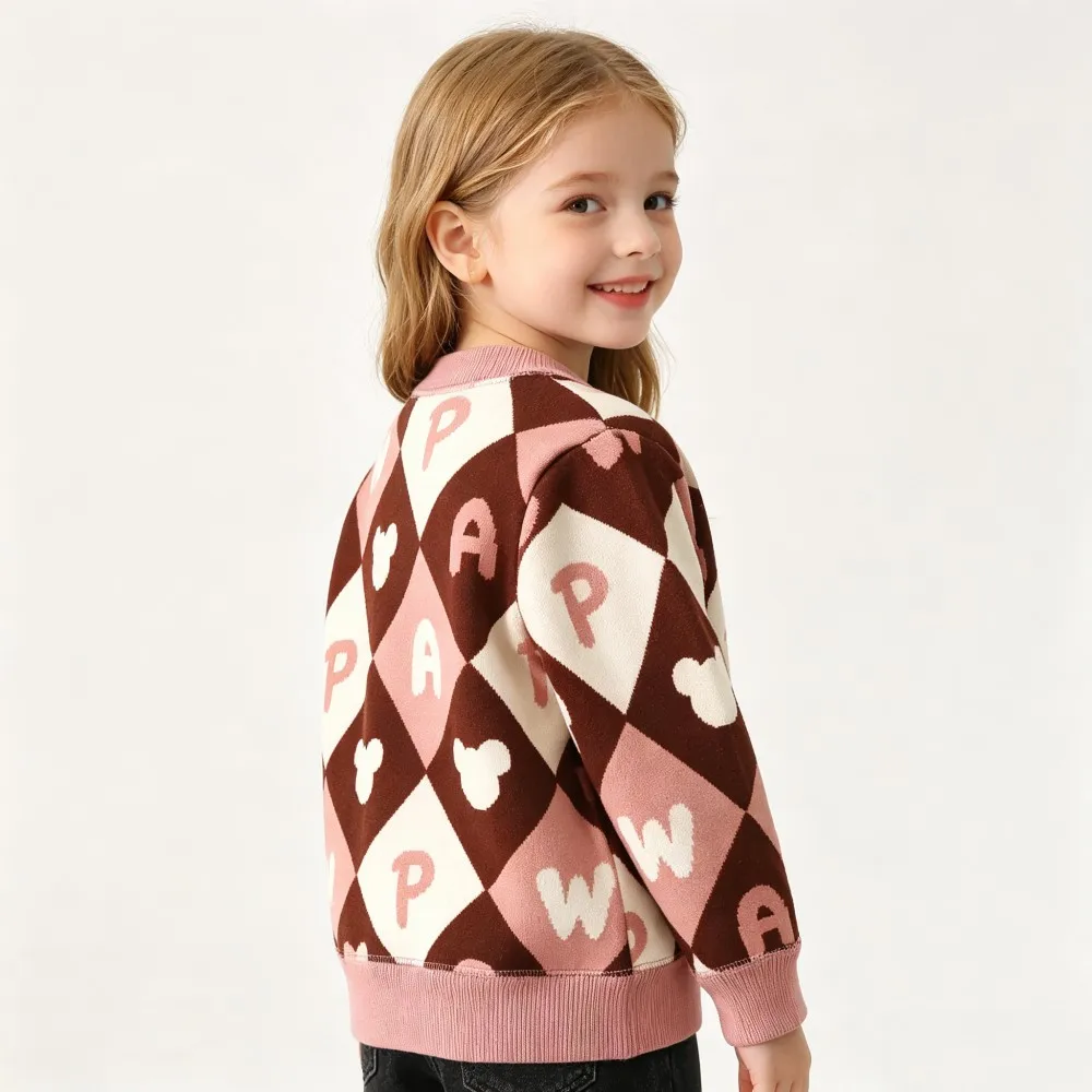 Back and side view of a brown and pink diamond-pattern cardigan with ribbed trim