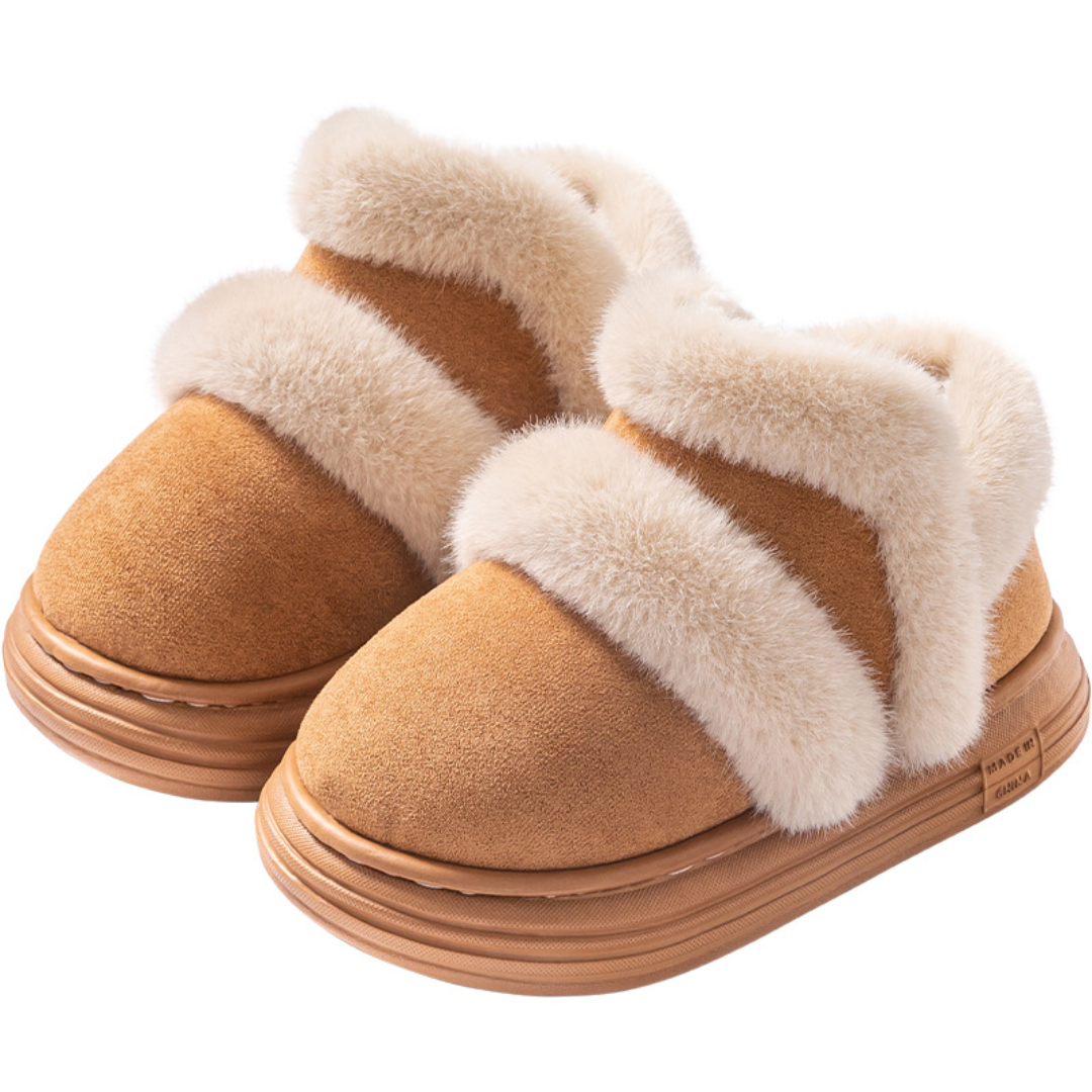 Brown ankle boots with cream plush trim and brown soles on a white background.