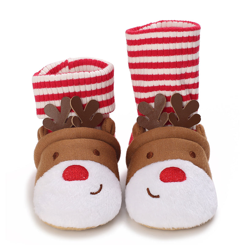 Brown reindeer baby slippers with red-and-white striped cuffs and white muzzles