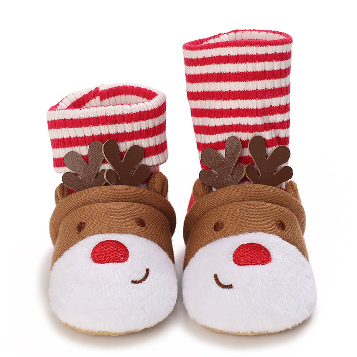 Brown reindeer baby slippers with red-and-white striped cuffs and white muzzles