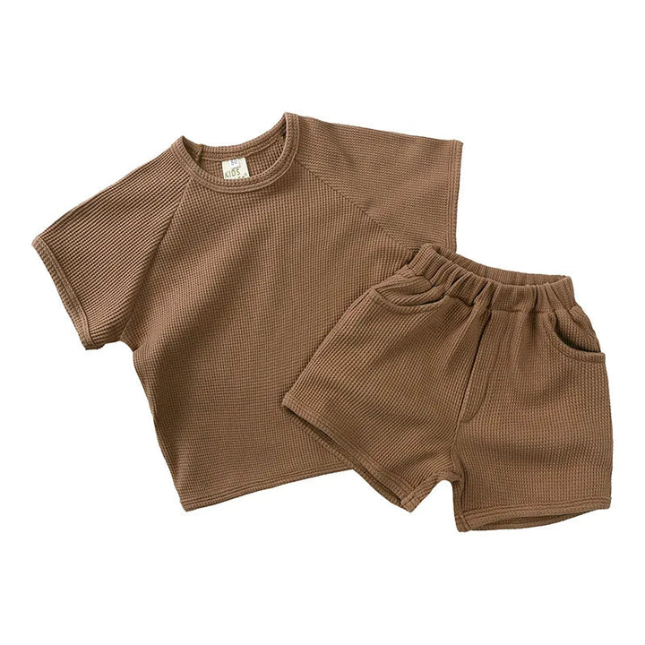 Brown textured T-shirt and matching shorts with an elastic waistband and front pockets