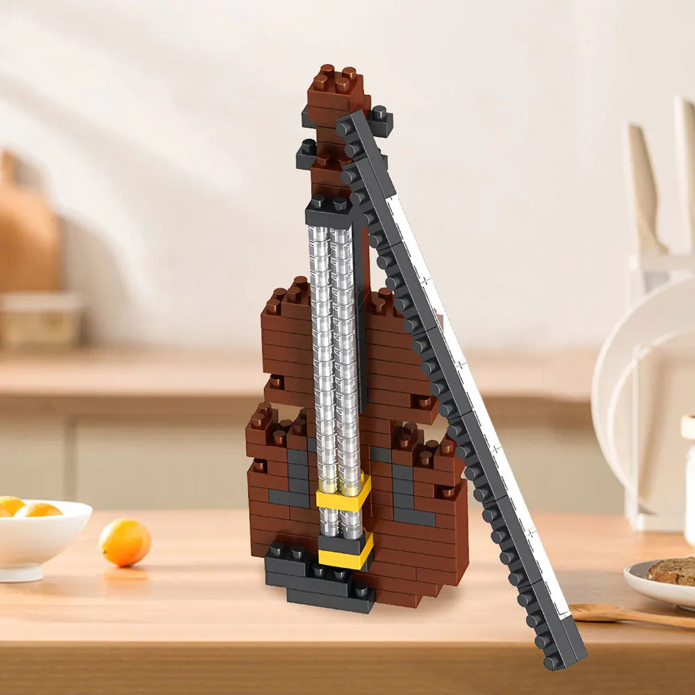 Brown miniature violin made from interlocking blocks with a gray bow