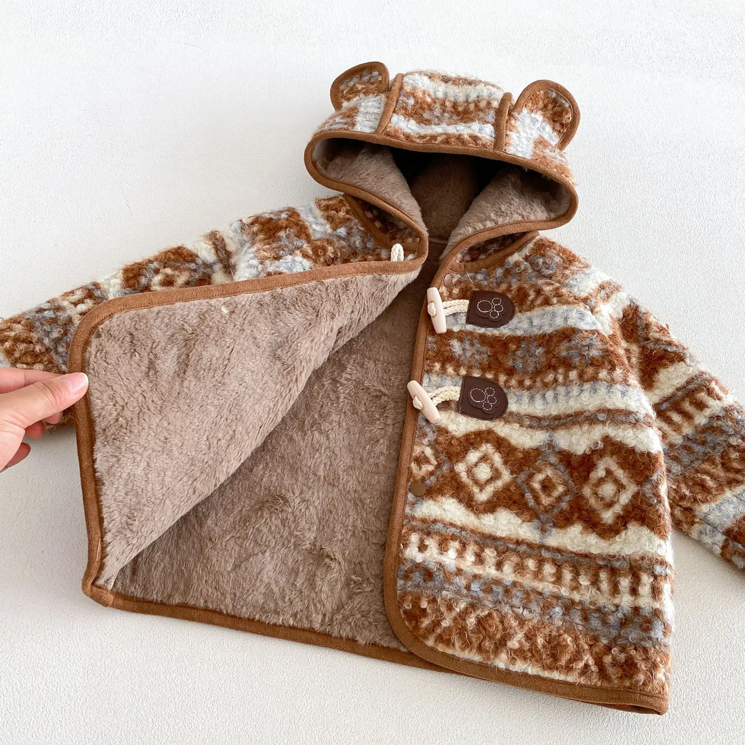 Brown winter jacket held open to show its soft inner lining