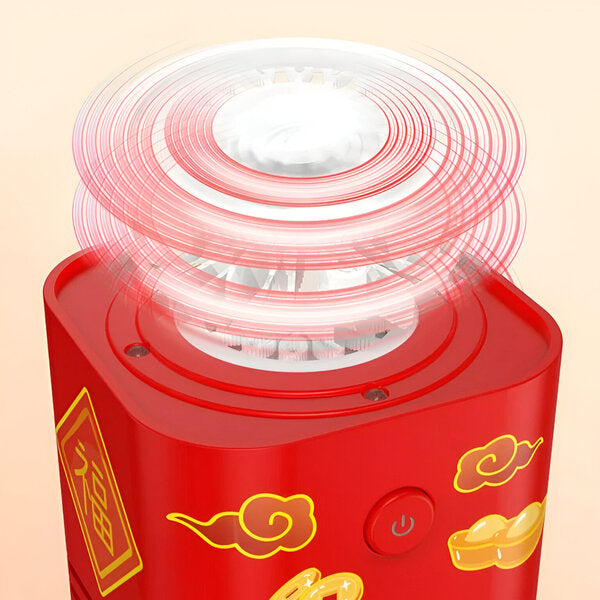 Circular nozzle assembly on top of the red bubble machine with illustrated motion rings