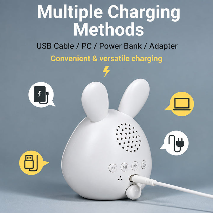 White bunny alarm clock viewed from the back with a USB charging cable connected