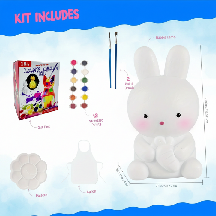 Bunny lamp kit contents showing an unpainted rabbit, paints, brushes, a palette, an apron, and measurements.