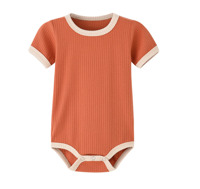 Burnt orange short-sleeve baby romper with cream trim and bottom snaps