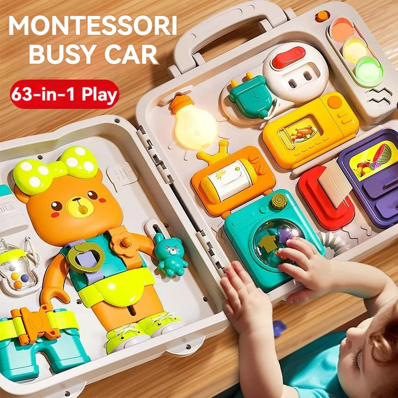 Child turning a dial on an open busy board with household-style switches and a bear activity panel
