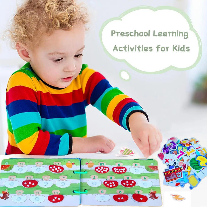 Child using a matching activity page beside a pile of colorful cards