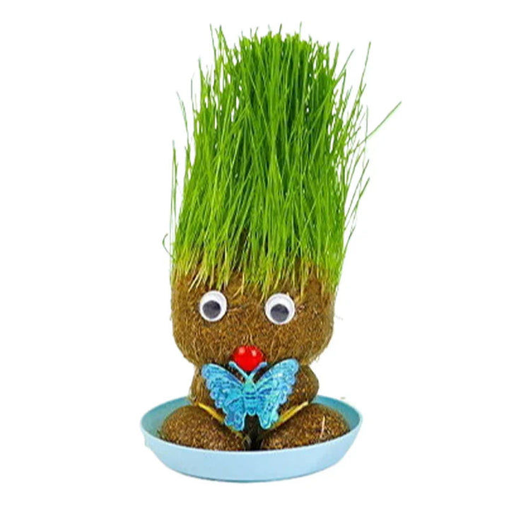 Grass-growing figure with a blue butterfly decoration in a blue bowl