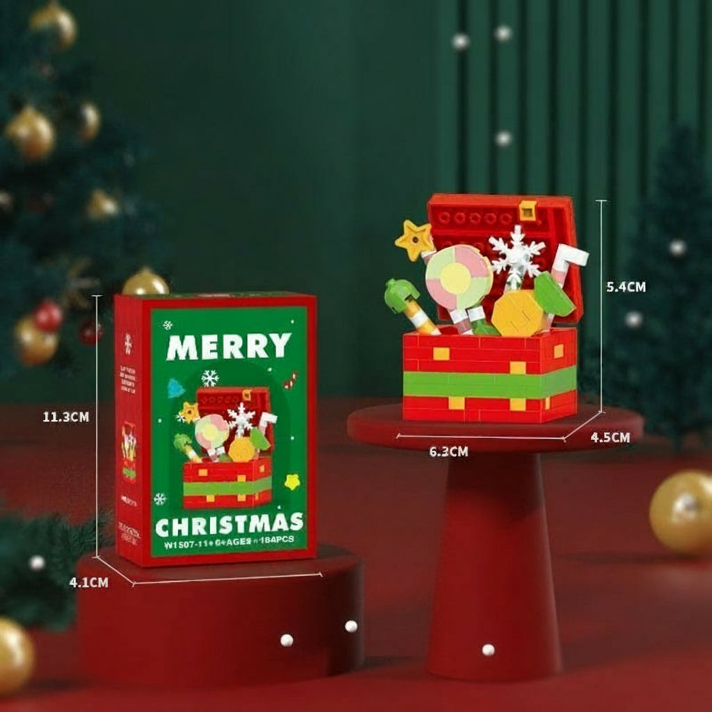 Red Christmas block candy chest filled with colorful shapes beside its box