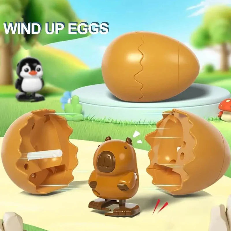 Brown capybara wind-up toy with its egg shell shown open and closed