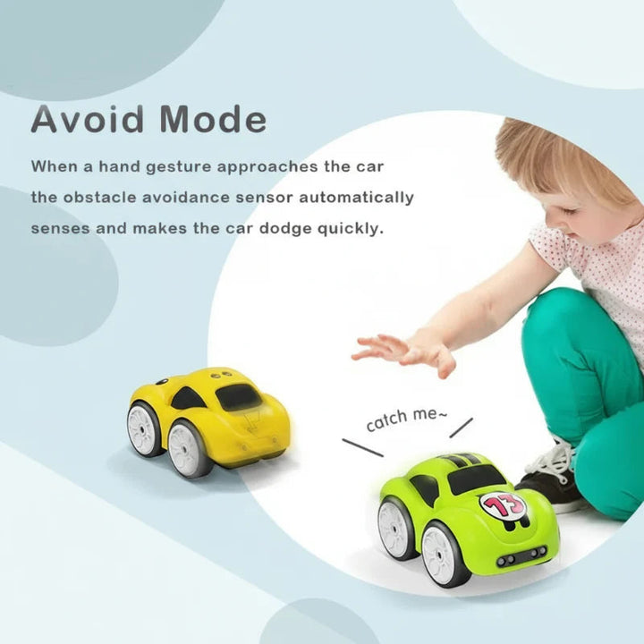 Child reaching toward cartoon cars in an obstacle-avoidance play graphic