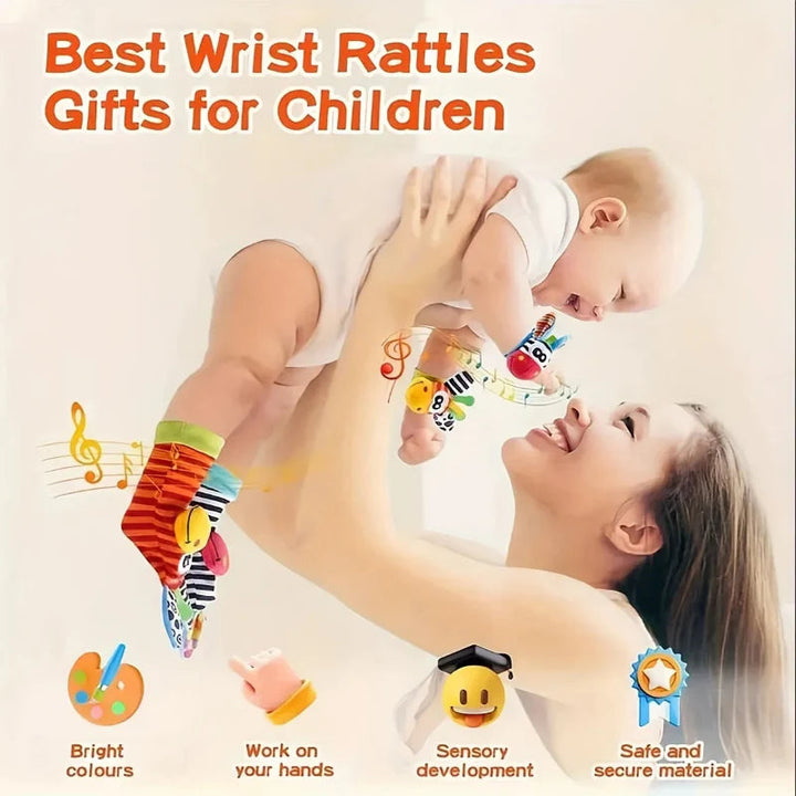 Caregiver lifting a baby wearing colorful animal wrist rattles and rattle socks.