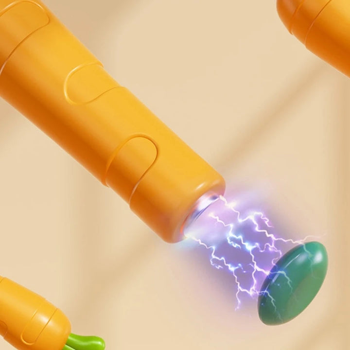 Magnetic carrot pen tip shown attracting a green bead