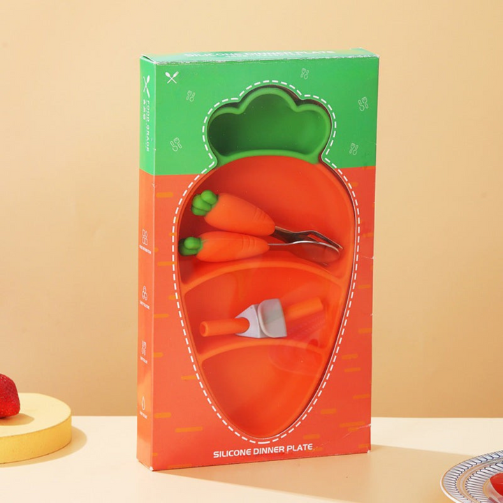 Orange carrot-shaped plate with coordinating cutlery and straw in a tall display box