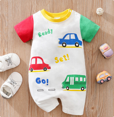 White baby romper with red and green sleeves, car graphics and a green bus