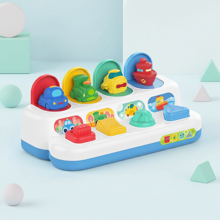 Cars activity toy with four colorful vehicles above matching controls