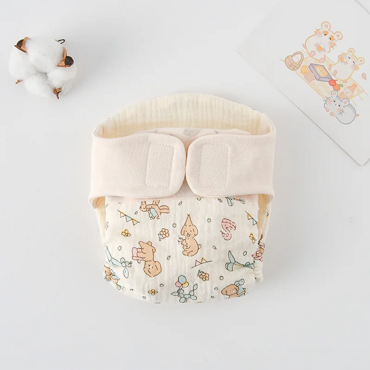 Cloth diaper with cartoon dogs and small colorful motifs