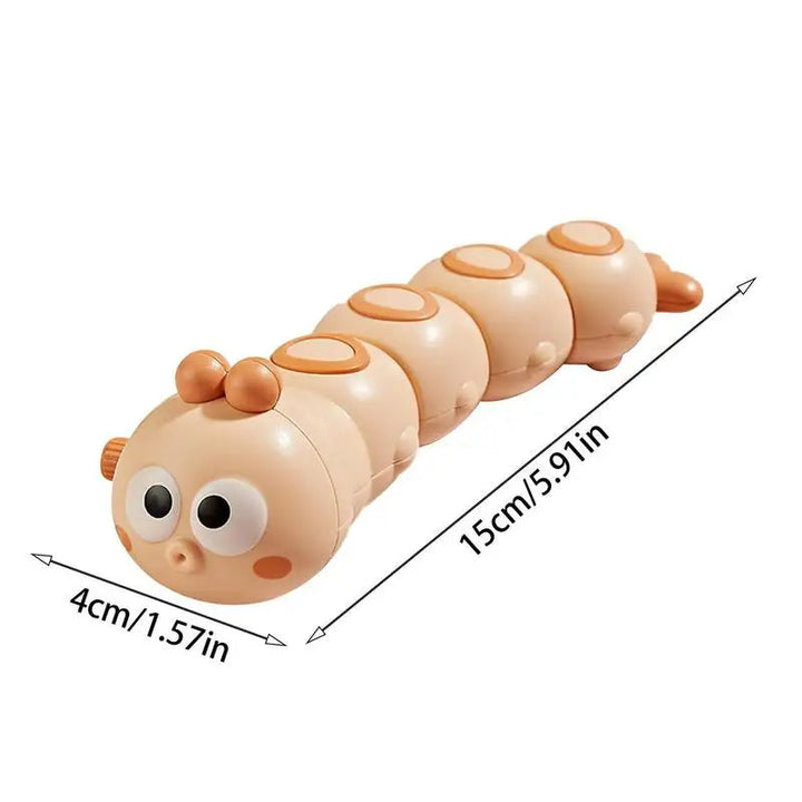 Orange caterpillar toy with measurements showing 15 cm in length and 4 cm in width