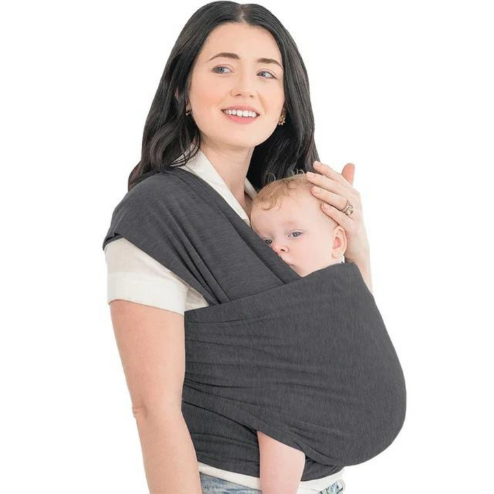 Parent wearing a charcoal-gray baby wrap with a baby nestled against her chest
