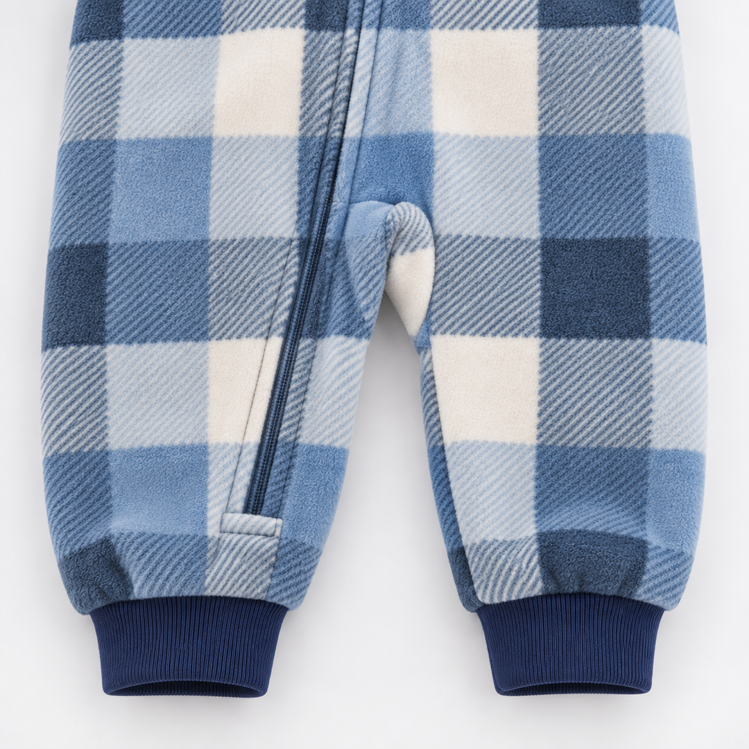 Front zipper, blue check fabric and navy ankle cuffs on a fleece baby jumpsuit