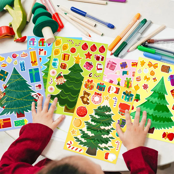 Child arranging Christmas tree sticker sheets on a table with craft supplies
