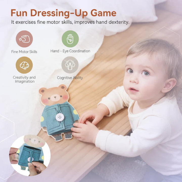 Child exploring the bear dressing toy at a table, with a close-up of button practice